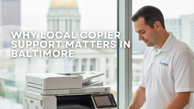 Technician providing fast, on-site copier service inside a Baltimore office, highlighting the advantage of local support over slow national providers.